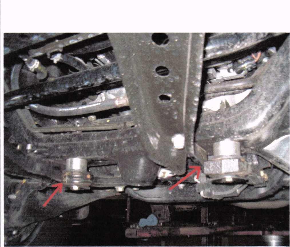 Page 17 of 36 STEP #16: Now you can put your front skid plate back on using the (2) 12mm bolts up top and (2) bolts down below near the cross member. For those of you that do use the front diff.