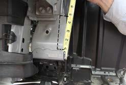 On the driver side, trim the plastic shielding under the bumper and towards the