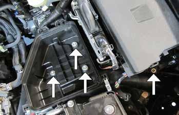 Locate the two clips securing the airbox lid next to the battery.