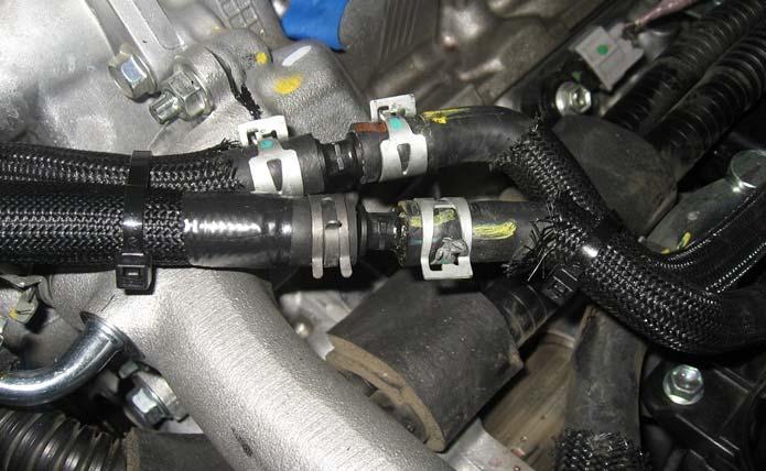 (r) Use the remaining 5/16 hose mender (Item A19) and clamp (Item A20) to connect one end of the heater hose to the free end of hose No. 10 (Fig. 16-12).