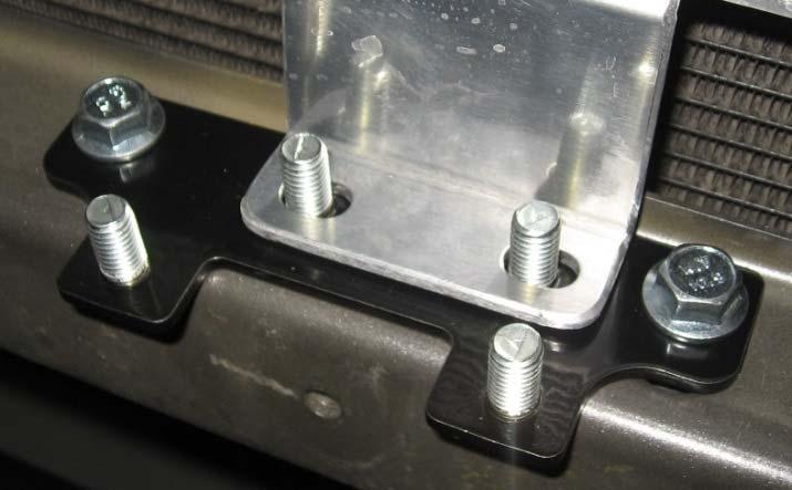 (2) Align the two rear M8 studs on the pump mounting bracket (Fig. 28-3).