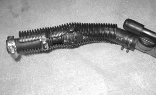 5. Replace the convoluting that was on the larger ½ hose to cover