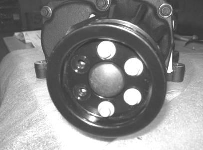 5. Install the 75mm supercharger pulley (1162-6K75) onto the hub of the supercharger using the six (6) M6 x 14 fasteners (N605771) found in