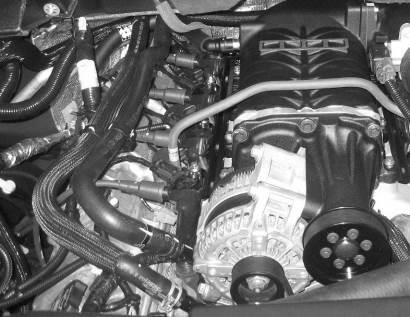 39. Re-connect the heater hoses to the tubes at the front of the engine. Secure into position with the clamps. 40.