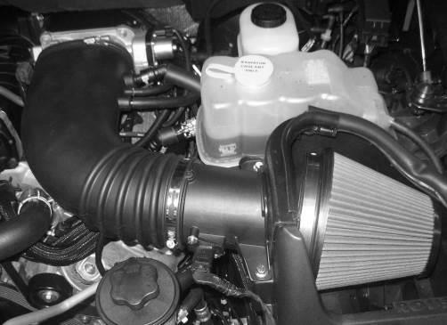 # 7 # 8 9. Install the new Clean Air Tube Assembly (11SC-9B659) into position between the throttle body and the MAF tube. Tighten the clamps on either end.