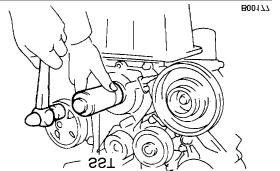 Page 12 of 25 3. Using SST and a hammer, tap in the oil seal until its surface is flush with the timing chain cover edge.