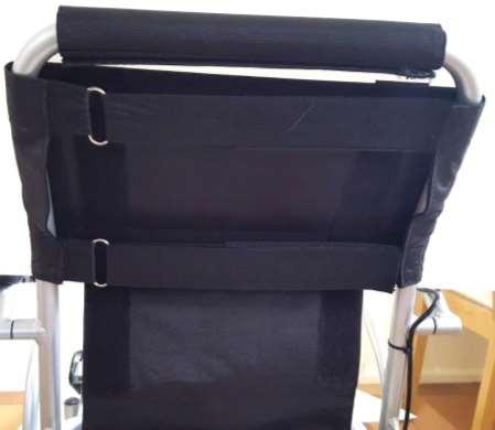 Then, attach front part of backrest padding to the Velcro (arrows).