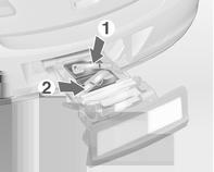 First place the front tail lamp (1), then the rear tail lamp (2) in the recesses and push