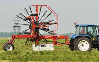 to 2.20 m. Rotor diameter of 3.80 m. Thirteen tine arms with four double Ro-tines per arm. Six-wheel rotor carriage with large 18.5/8.5-8 wheels.