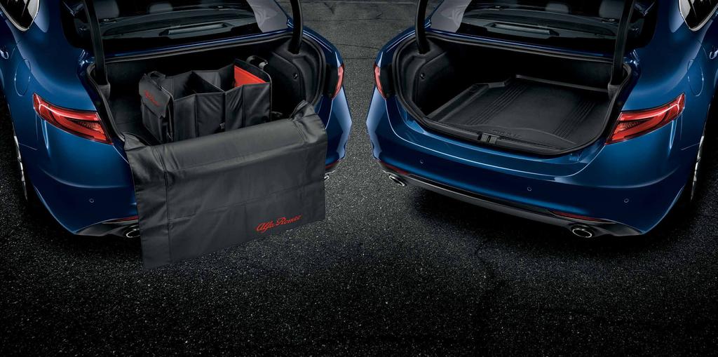 UTILITY LUGGAGE COMPARTMENT MAT In black colour with Giulia naming. To restrain objects and protect the boot.