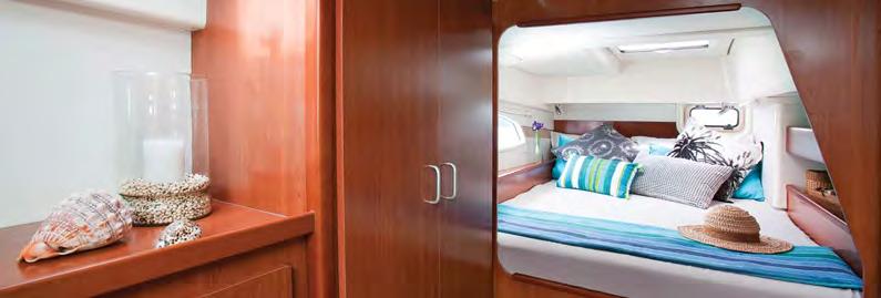 Located aft, the master stateroom features a large double berth, book shelf, adjustable reading lights, hanging locker, plenty of