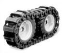 TRACKS OVER-THE-TIRE Over-The-Tire Tracks can be installed and removed easily and efficiently for improved traction, tire strength and protection on Komatsu Skid Steer Loaders in soft, muddy, sandy