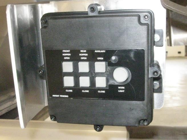 OPERATION INSTRUCTIONS Programming Remote to the Easy Flow Hopper Doors: 1. Power up the control box.