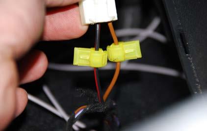Step 30: Locate the two yellow T-taps from the installation kit. The T-taps work in the following manner: Blade 1.