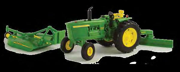 features opening hood on tractor, steerable front wheels and lights and