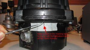 #1 in the Service Manual) and mark the position of the rotor