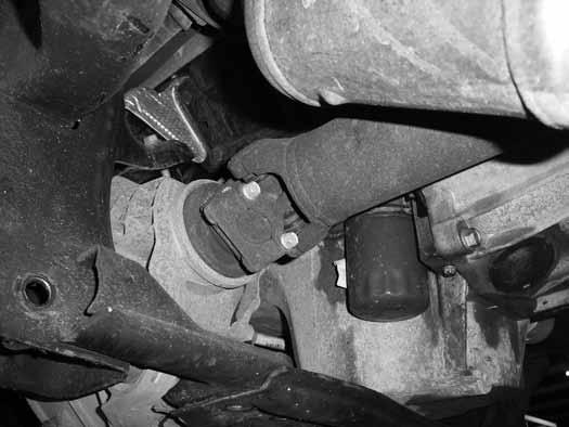 Remove driveshaft from the transfer case. Save the driveshaft hardware. Figure 13 25.