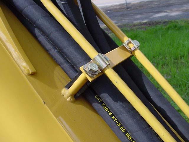 8 Alternate tube mounting with hammer circuit return hose When the tractor is