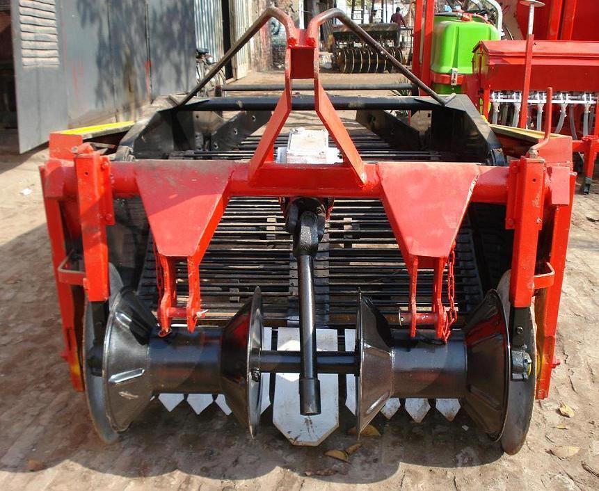 Potato Digger Potato digger with rear un-loading that can be mounted on tractors equipped with three point linkage and Power takeoff (PTO).