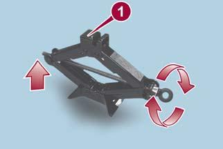 Loosen the lug nuts by turning them counterclockwise one turn each, but do not remove any lug nuts until the tire has been raised off the ground. 2.