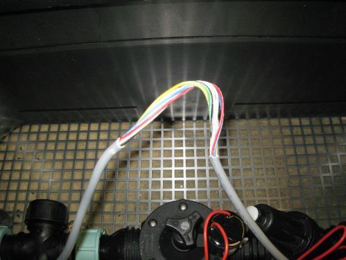 4) Using a grease crimp connector insert the two ends of the zone wire and one solenoid