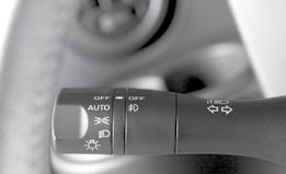 06 Pull the lever toward you to activate the front washer. The front wipers will operate several times.