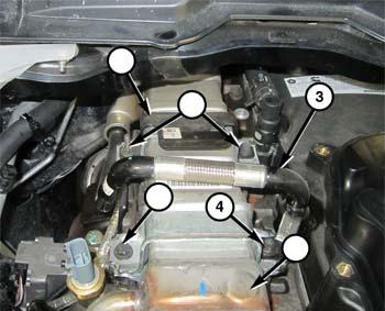 20. Remove the bolt (4) and rear coolant tube (3). 21.