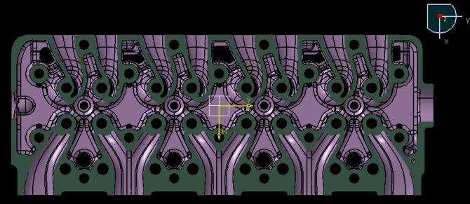 for the casting. At Figure 8, the pattern geometry for the cooling water passage and at Figure 9, a top-down cross-section look at the intake and exhaust ports of cylinder head is shown.