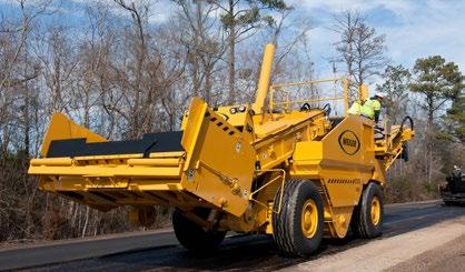 Problem solver Uneven or segregated materials are remixed and delivered to the paver in a consistent manner Large caster