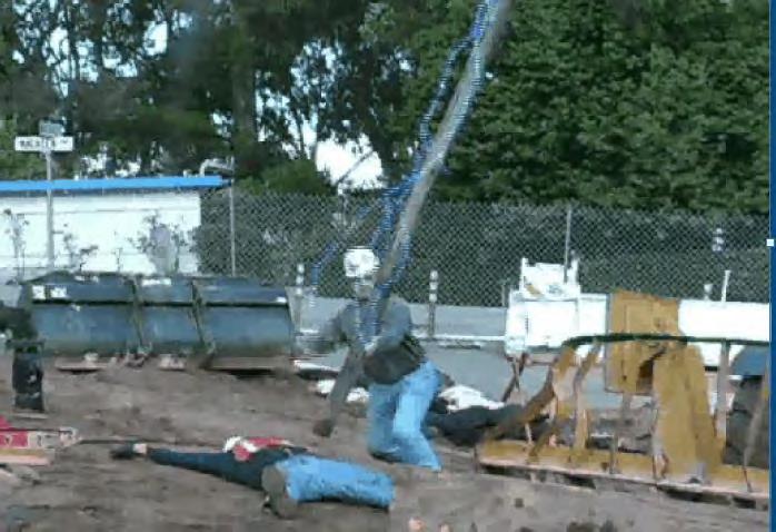 As an example, the hose man leads the boom into power lines and then falls to the ground unconscious.