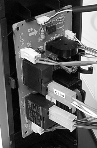 Remove the screw from the decorative panel. Screw 5. Disconnect the following connectors from the control board: a) 3-wire connector from CN-F.