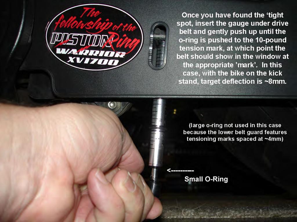 Once that is recorded, leave the bike on the ground and bounce it on its suspension a couple times to free the suspension after having been up in the air, then check belt tension again.