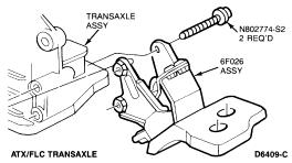 With jack supporting transaxle, remove two motor mount-to-transaxle retaining bolts. Remove rear mount assembly. 13.