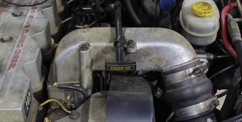 DODGE RAM 24V 5.9L CUMMINS SECTION 2 Boost Gauge Installation OPTION B: Drilling & Tapping the Intake Manifold Horn: 1.
