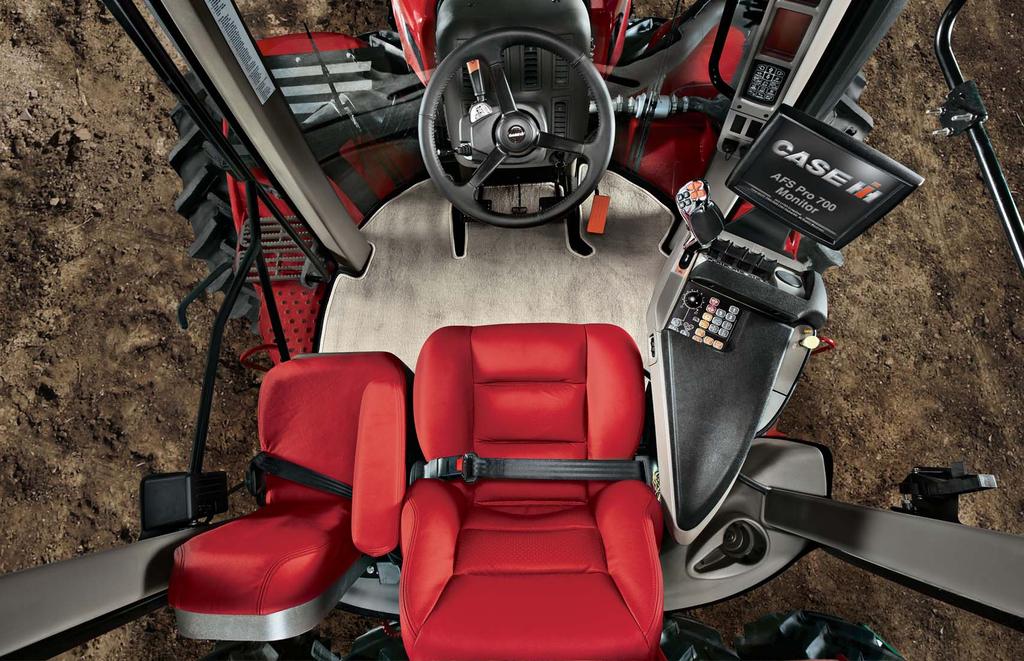 A LARGEST CAB IN THE INDUSTRY and ergonomic armrest controls make for a comfortable and productive workday.