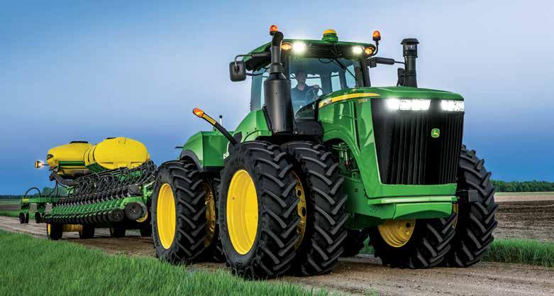 The hydraulic and electrical systems work together to maintain a level and vertically centered position of the front differential case in relation to the tractor s chassis, independent of tractor