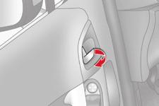 From inside F Pull the front door control to open the door; this unlocks the vehicle completely.