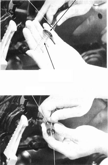 Remove the jet needle by removing the needle clip.