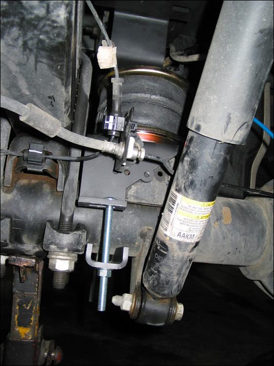 install the air spring assembly. If the vehicle has a fifth wheel hitch along the side of the frame, skip to the next section.