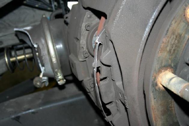 Inspection Other types of brake assembly damage Damage caused by a missing pad
