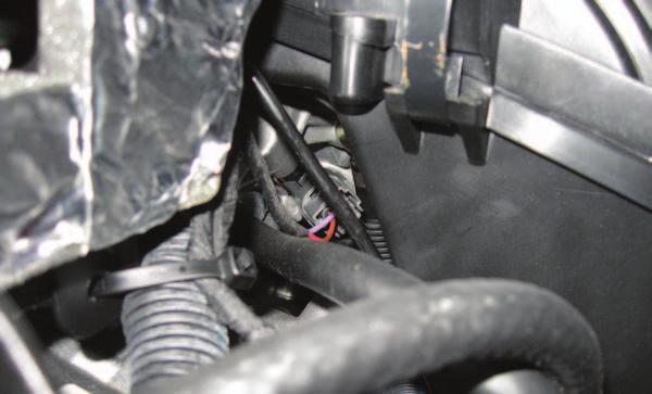 H 15 Unplug the stock wiring harness from the injector on the right hand side (Fig. H).