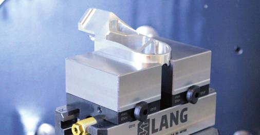 We suggest using a clamping block, clamped between the top jaws while machining the workpiece contour into the add-on jaws.