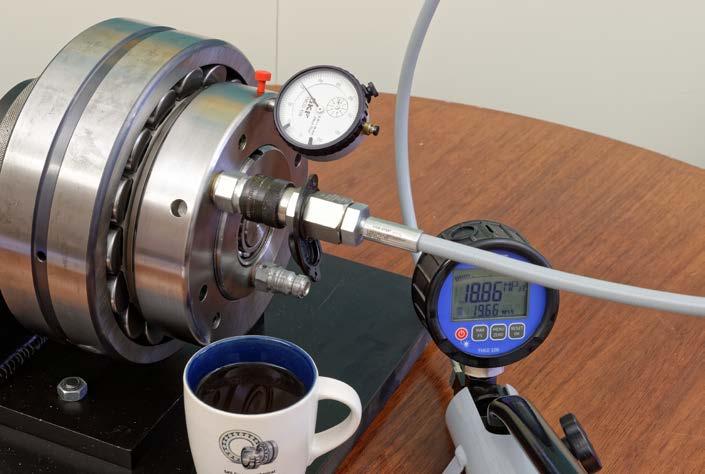 Step 12: When the final drive-up value is reached do not release hydraulic nut pressure, take a coffee break instead Fig.