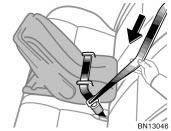 Keep the lap portion of the belt tight. After inserting the tab, make sure the tab and buckle are locked and that the lap and shoulder portions of the belt are not twisted.