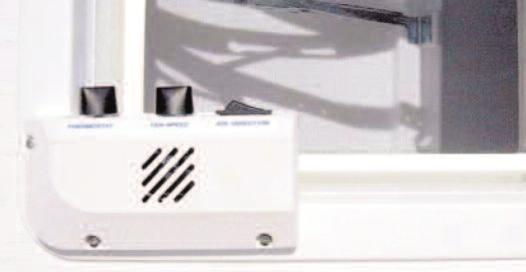 Be certain the 12 volt +/- power wires run under the cover screw tab in that area. Bundle extra wire into the area shown.