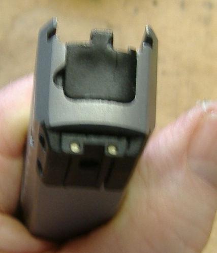 So here goes: Field strip the pistol and start with the slide upside down like this (assuming you are right handed).
