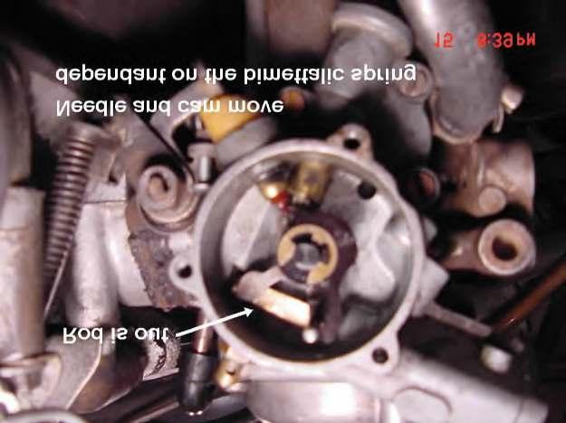 Page 7 of 16 When you start the car, the carb creates a vacuum in the kick piston and the rod is pulled out. (Picture 10).