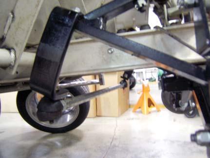 Tighten bolts to 14 pound feet. 26 51. Install tie rod upside down on the bottom of the extenders. (See Figure 27) 52.