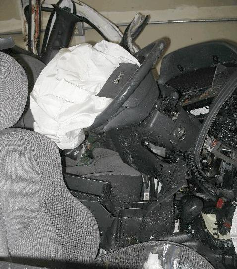 Figure 12. Deployed front right passenger s air bag Figure 11.