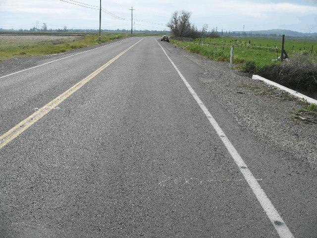 shoulders. The crash occurred on a straight portion of the roadway. There was a left hand curve for the eastbound approach. The posted speed limit was 89 km/h (55 mph).